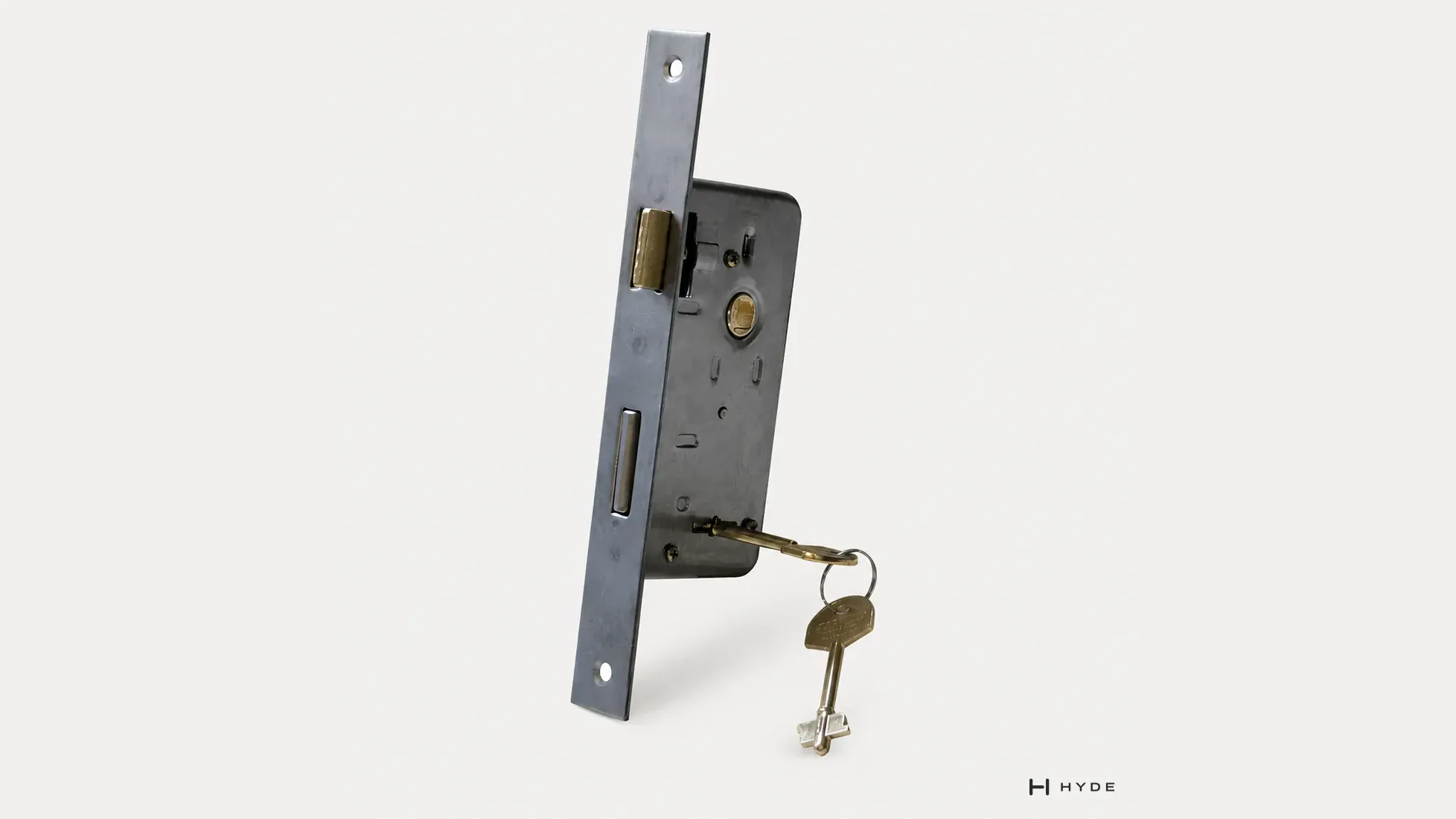 AR4-110 security mortise lock body with its key, original catalog photograph.