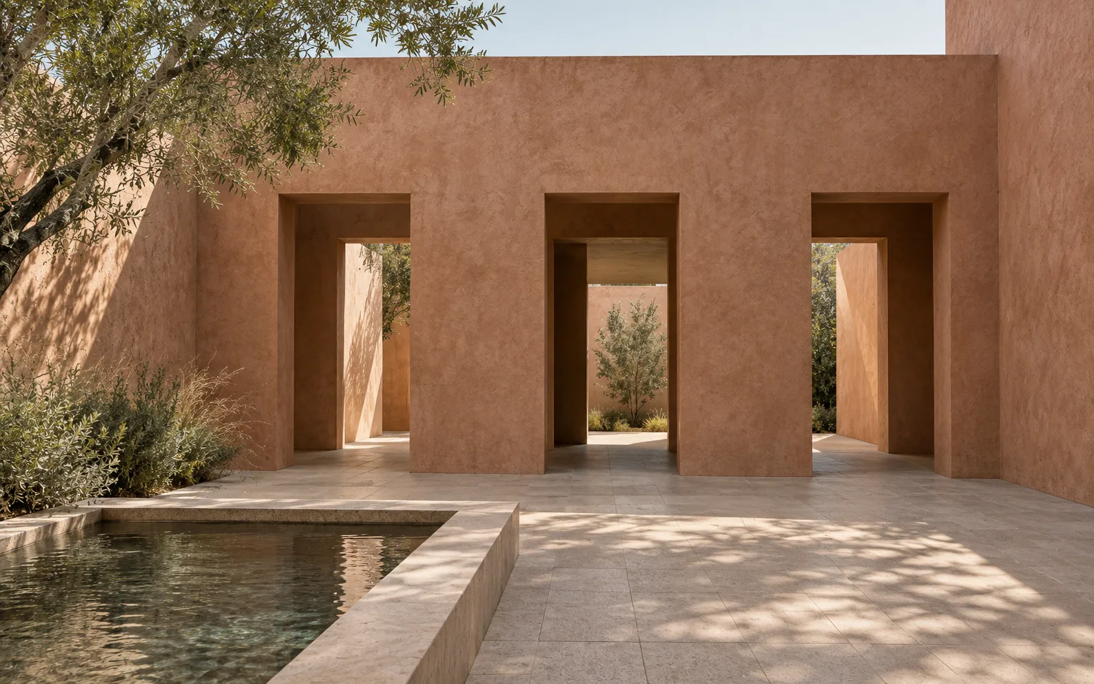 A terracotta-plaster courtyard