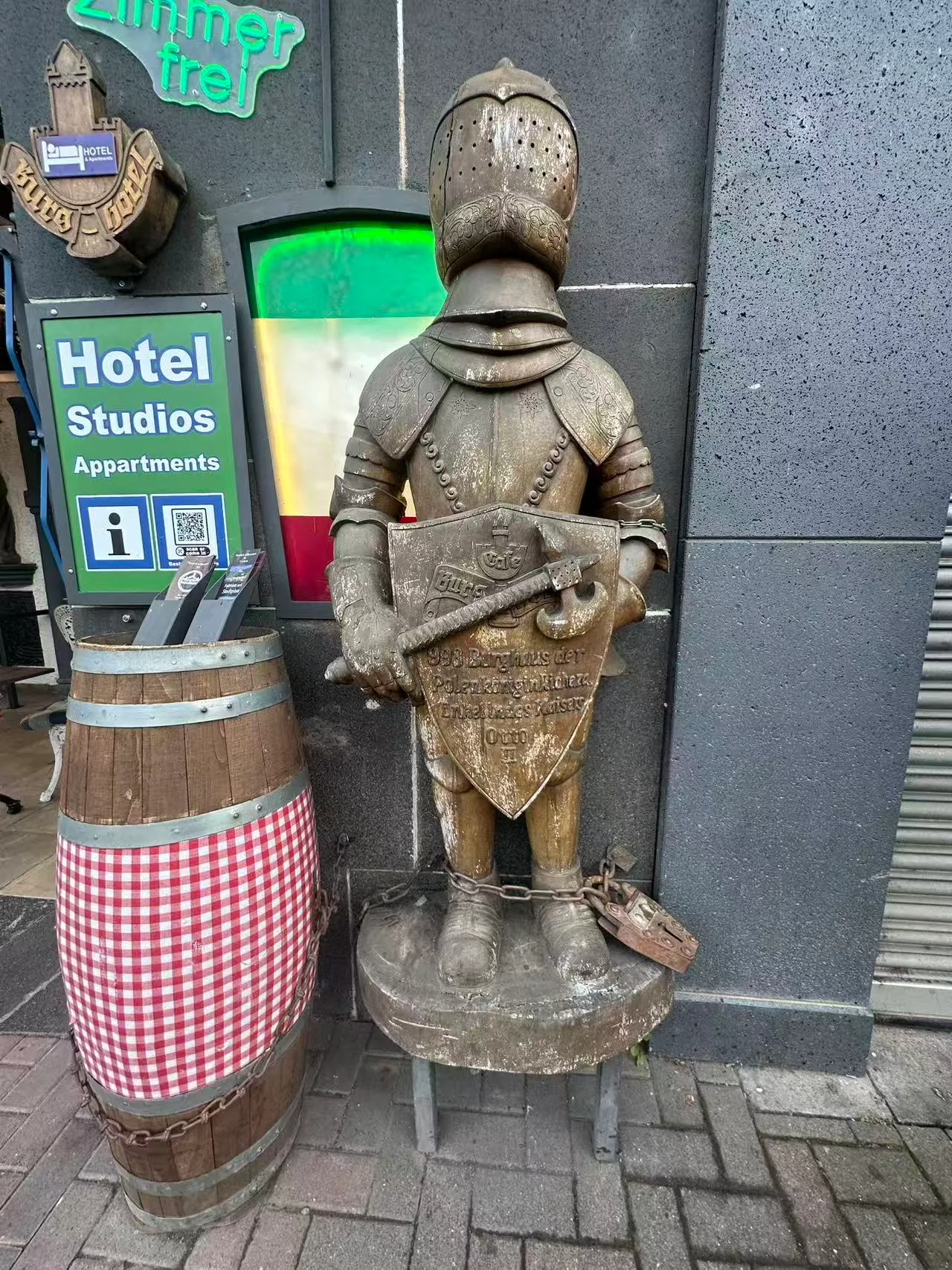 Where it lives: chained around the ankles of a cast knight outside a hotel in Germany, whose shield claims the year 998