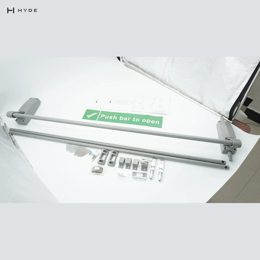 Everything in the 308-D box: push bar, two vertical rods, rod guides, top and bottom latches, strikes, fixings and the fitting instructions