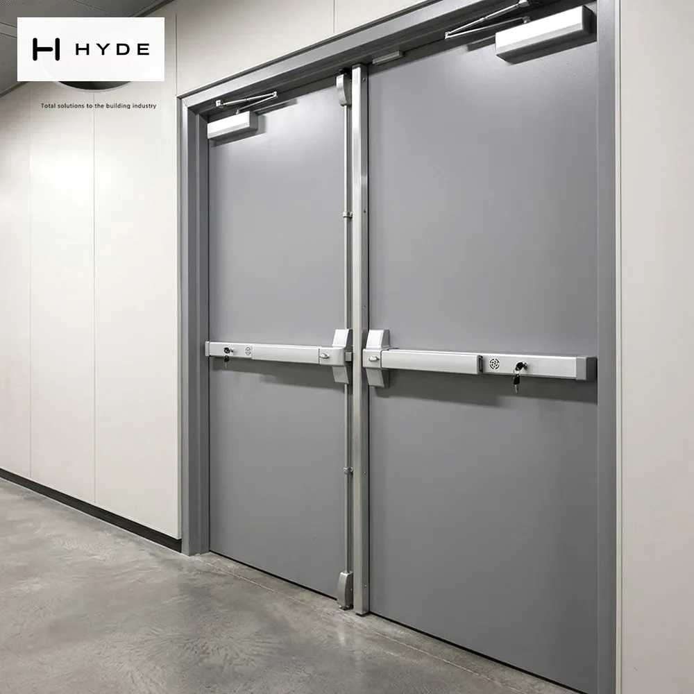 A pair of 314 panic bars installed on double steel doors